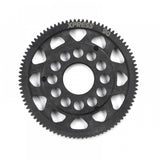 Xpress 64P composite spur gear with precise teeth and durable construction, shown in a close-up view.