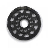Xpress 64P composite spur gear showing gear teeth and black plastic construction on a white background.