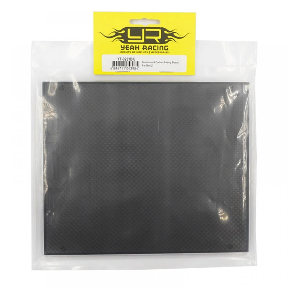 Yeah Racing graphite setting board for Mini-Z cars, displaying a black, rectangular tool with measurement markings and textured surface.