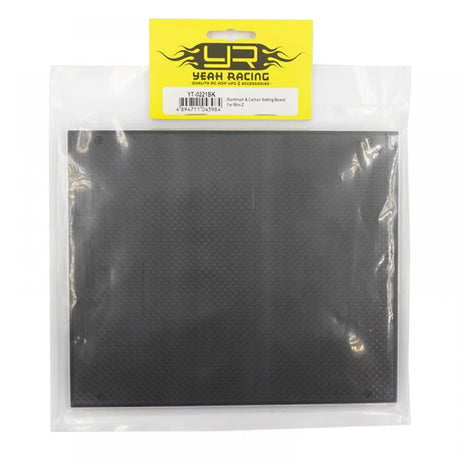 Yeah Racing graphite setting board for Mini-Z cars, displaying a black, rectangular tool with measurement markings and textured surface.