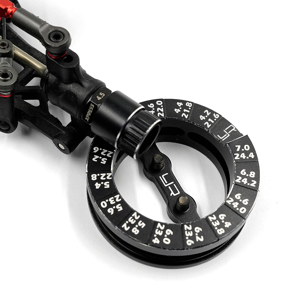 Yeah Racing aluminum round droop gauge for 1/10 touring car, shown with measurement markings and sleek black finish.