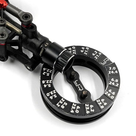 Yeah Racing aluminum round droop gauge for 1/10 touring car, shown with measurement markings and sleek black finish.