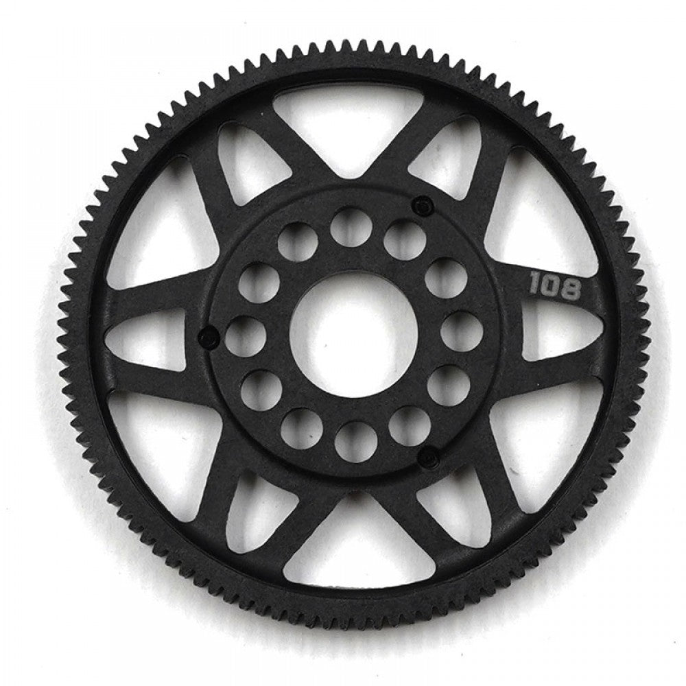 Xpress 64P composite spur gear with precise teeth, designed for RC models, shown in close-up with metallic finish.