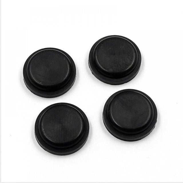 Set of four Xpress Shock Membrane V2 replacement parts, durable rubber shock absorbers for RC vehicles.