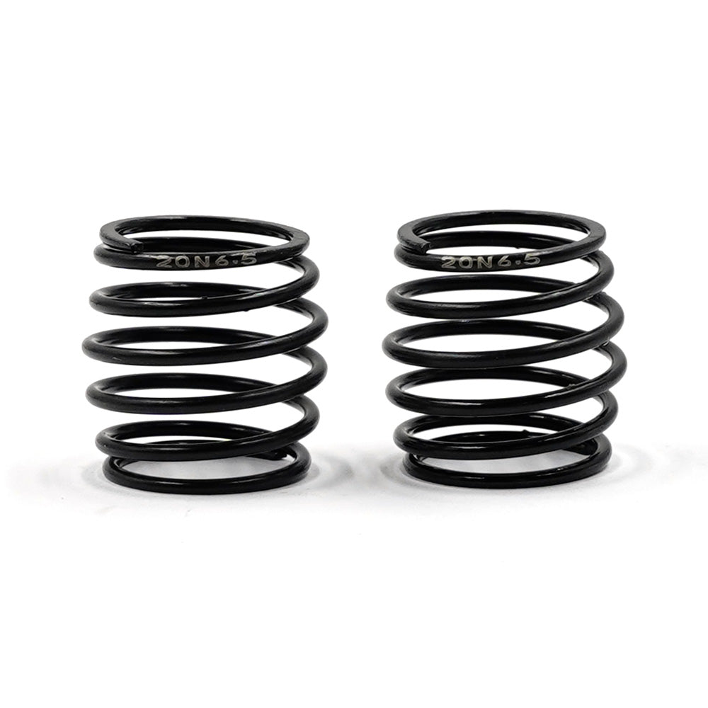 Two Xpress 20mm barrel springs shown in black, designed for RC car modifications, with coiled metal construction and durable springs.