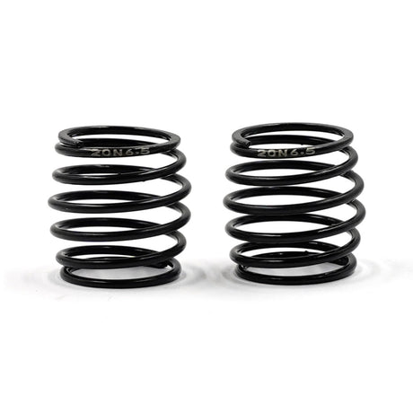 Two Xpress 20mm barrel springs shown in black, designed for RC car modifications, with coiled metal construction and durable springs.