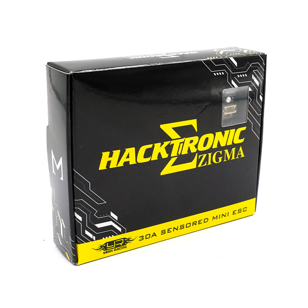 Yeah Racing Hacktronic Zigma 30A sensored brushless ESC with cooling fan and wiring for RC cars, mounted on a circuit board.