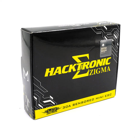 Yeah Racing Hacktronic Zigma 30A sensored brushless ESC with cooling fan and wiring for RC cars, mounted on a circuit board.