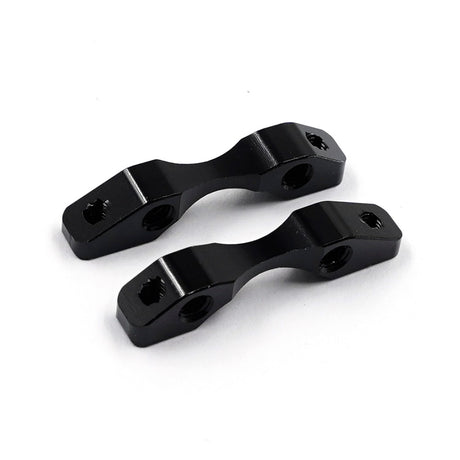 Xpress aluminum suspension mounts for graphite lower arms, shown in black with mounting holes for vehicle suspension setup.