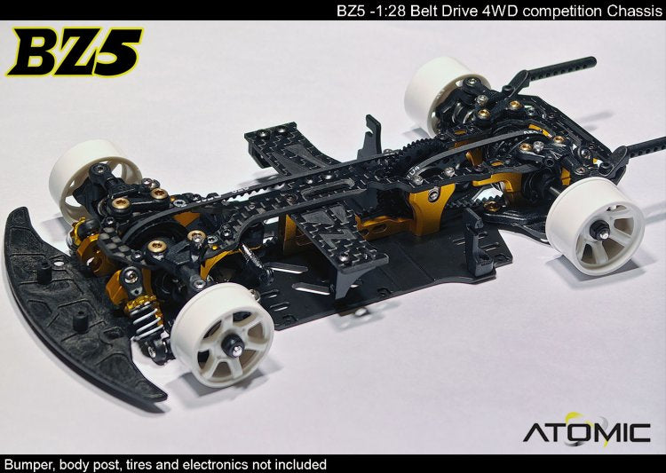 Atomic RC Z5 Belt Drive 4WD chassis kit with black and silver components, showing the assembled frame and drive system.