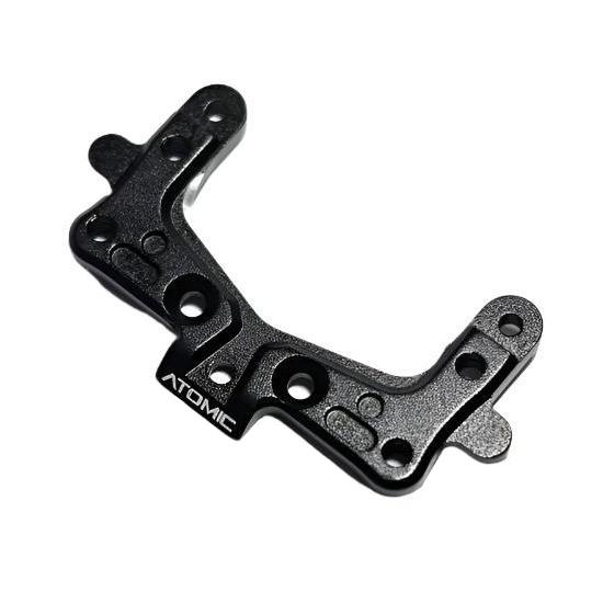 Atomic RC MRX 1.5 degree caster mount for DWS suspension system, showcasing the precision-machined aluminum component.