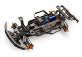 Traxxas Ford Raptor R 4X4 Ultimate RC truck chassis with detailed suspension components and body mount area, no tires visible.