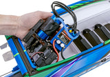 Traxxas Spartan SR 36-inch boat electronics tray showing internal components and wiring setup for RC boat.