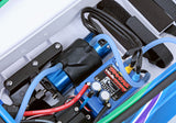 Traxxas Spartan SR 36-inch RC boat with water cooling system, detailed hull, and vibrant blue and white design.