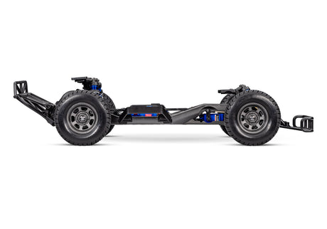 Side view of Traxxas Slash Modified BL-2s RC truck chassis showing detailed modifications and durable construction.