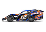 Traxxas Slash Modified BL-2s RC truck with blue body and off-road tires, showcasing a sleek side view.