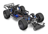 Traxxas Slash Late Model BL-2s RC truck chassis viewed from a three-quarter front angle showing detailed construction.
