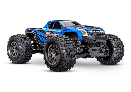 Traxxas Mini Maxx 1/16 scale RC truck with blue body, front view showing detailed design and rugged off-road tires.