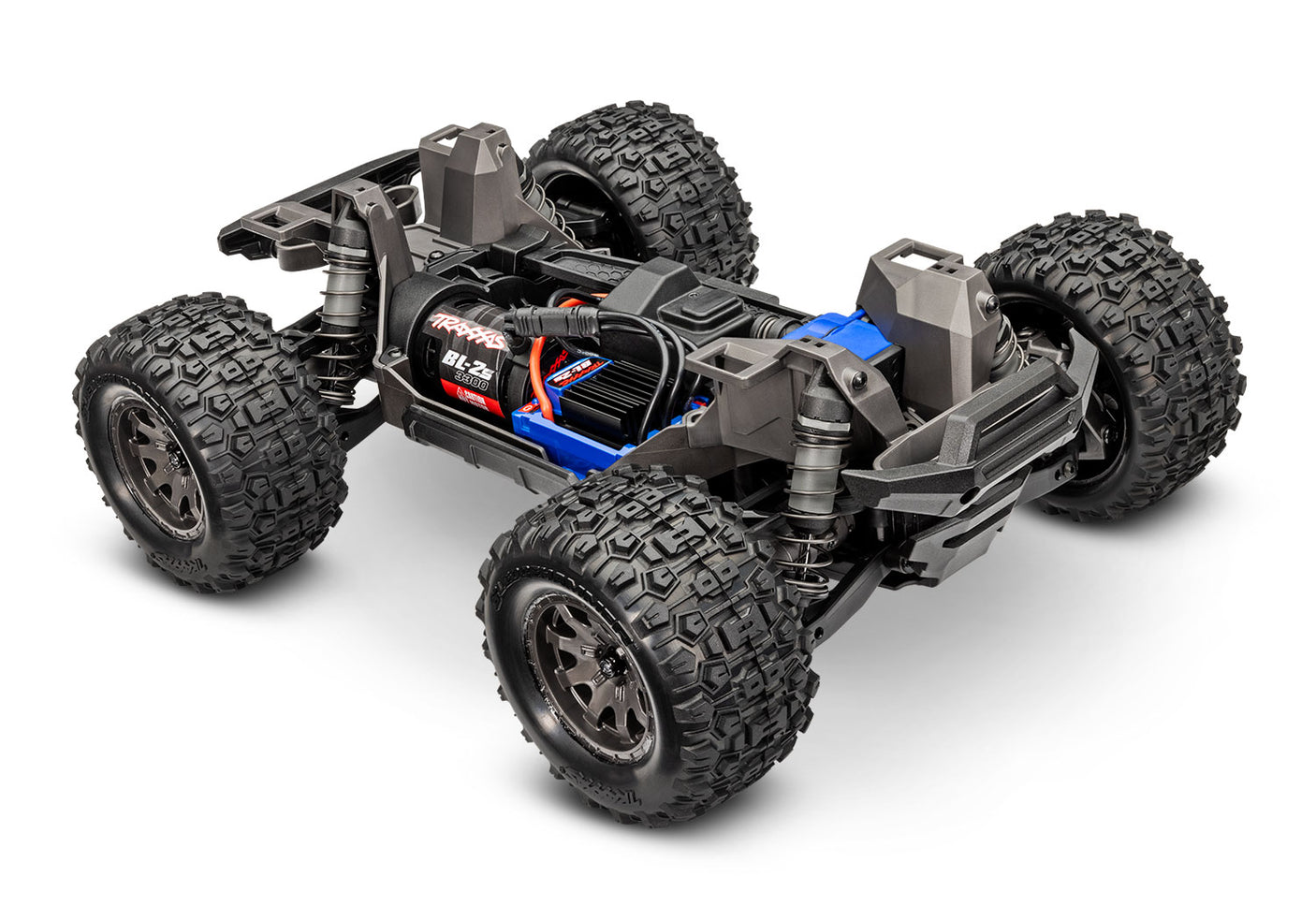 Traxxas Mini Maxx 1/16 scale electric RC truck with high chassis and detailed body in the image.