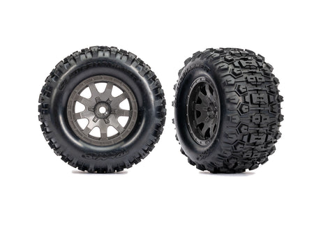 Traxxas Mini Maxx and XRT 4-inch rear wheels in gray, showing close-up of durable off-road RC vehicle wheels.
