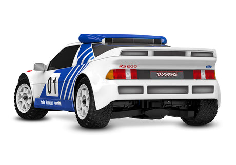 Traxxas Mini Rally VXL Ford RS200 remote control car viewed from a three-quarter rear angle, showcasing its detailed design.