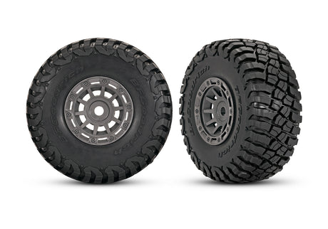 Pair of Traxxas 1.4-inch gray wheels with BFG mud-terrain tires for RC trucks, shown in the image.