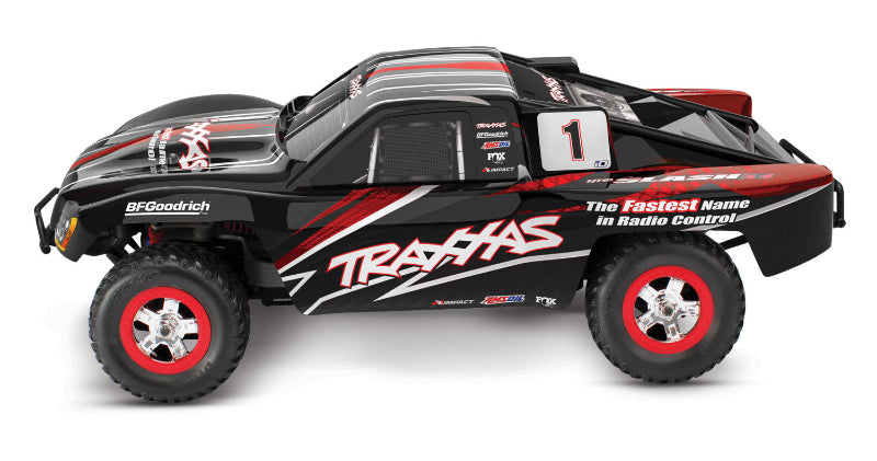 Traxxas 1/16 Slash 4X4 RC truck with detailed body and off-road tires, shown in a close-up side view.
