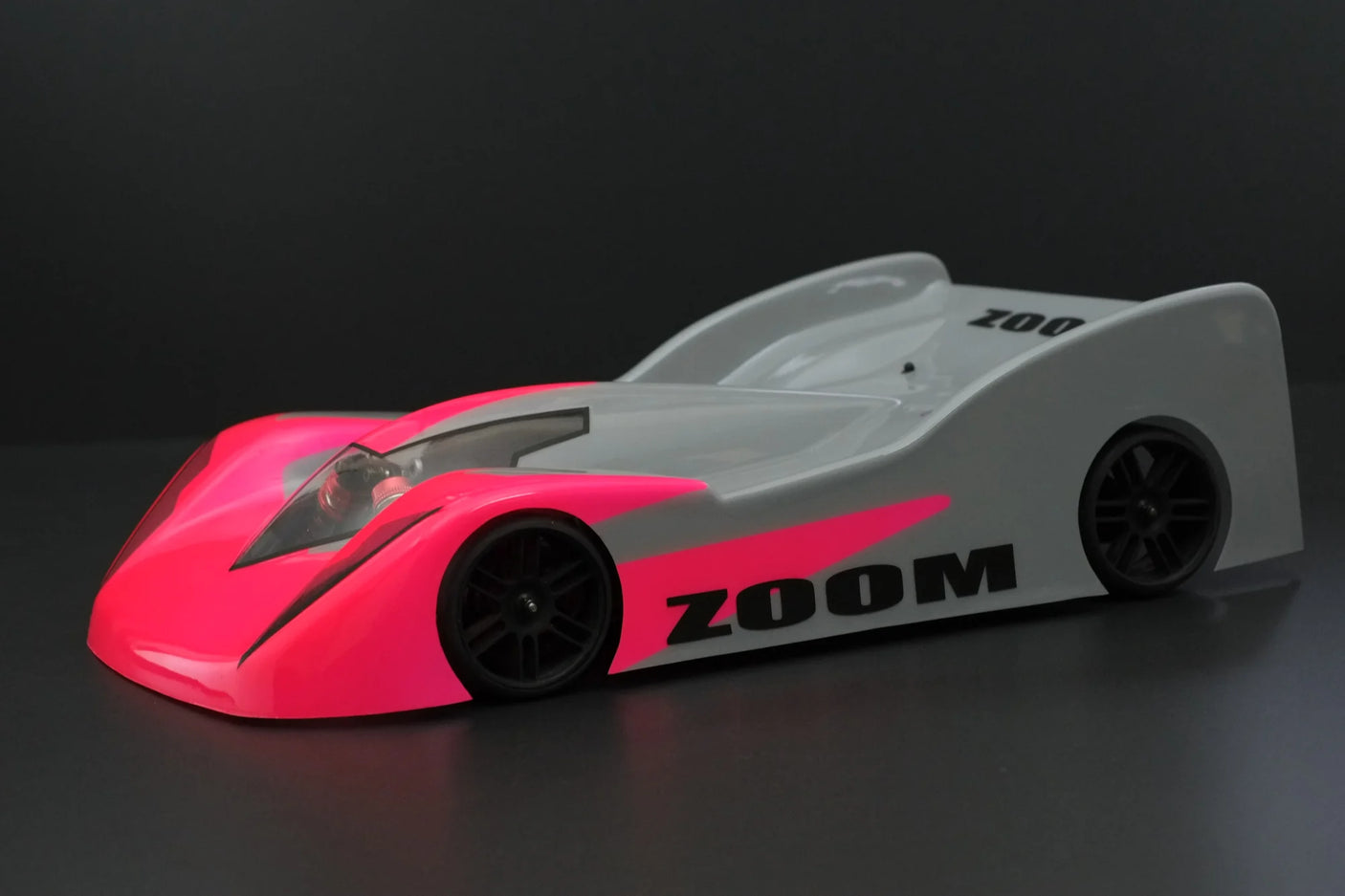 RC body by Phat Bodies featuring the Zoom Speedrun 225mm wheelbase, shown with sleek aerodynamic design and vibrant graphics.