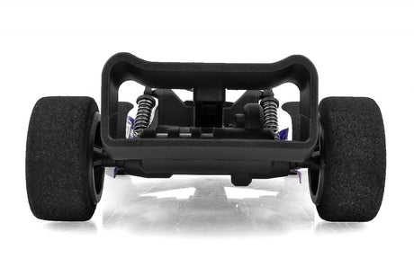 Team Associated F28 Formula RC 1/28 scale 2WD remote control car displayed outdoors with detailed body and racing design