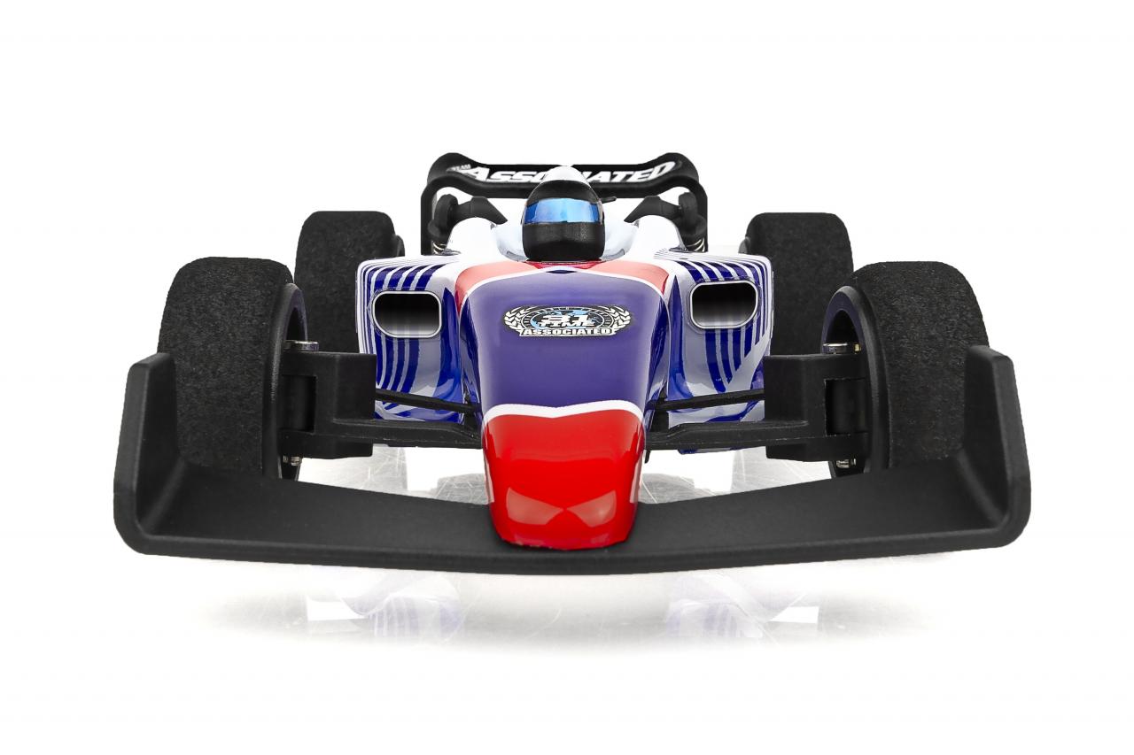 Team Associated F28 Formula RC 1/28 scale 2WD RC car shown in low-angle view with sleek design and vibrant colors.