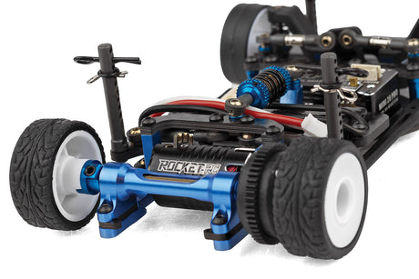 RC28 Team Associated RC car kit with axel and rear components, detailed view of the assembly parts and hardware.