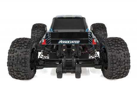 Team Associated Reflex 14MT 1/14 scale 4WD RC monster truck on a track, showcasing rugged tires and detailed body design.