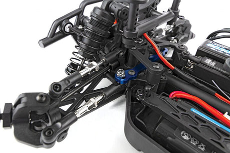 Team Associated Reflex 14MT 1/14 4WD RC monster truck with front steering and large tires, shown from the front angle.