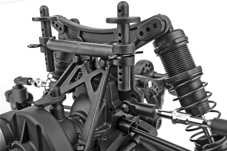 Team Associated Reflex 14MT 1/14 scale 4WD monster RC car with shock towers and body in a detailed image.