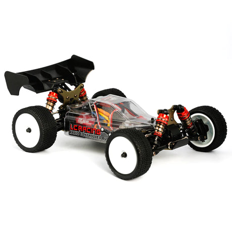 LC Racing EMB-1 1/14 4WD Buggy Kit, close-up of the detailed RC buggy chassis and components on a plain background.