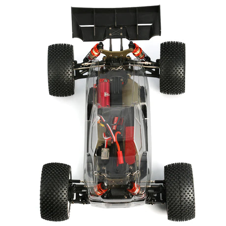 LC Racing EMB-T Pro 1/14 4WD Truggy Pro Kit with detailed chassis and suspension components, ready for RC racing.