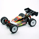 LC Racing EMB-1 1/14 scale 4WD RTR buggy, detailed close-up showing chassis, tires, and suspension components.