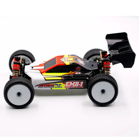 LC Racing EMB-1 1/14 scale 4WD RC buggy with detailed body and off-road tires, ready for off-road racing.