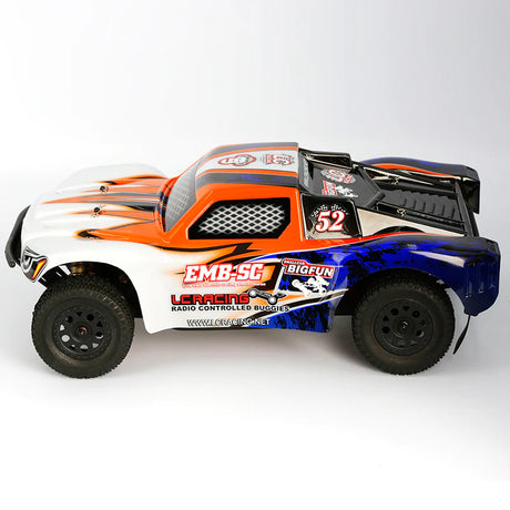 LC Racing EMB-SC 1/14 scale 4WD short course truck with detailed chassis and colorful body, ready for off-road racing.