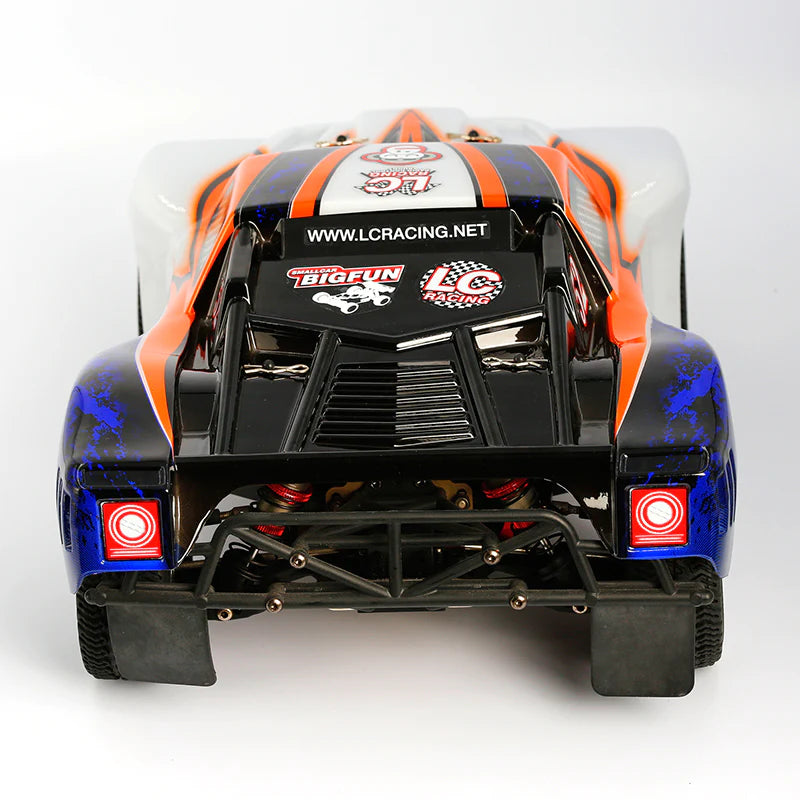 LC Racing EMB-SC 1/14 scale 4WD RTR short course truck with detailed body and off-road tires, ready for RC racing.