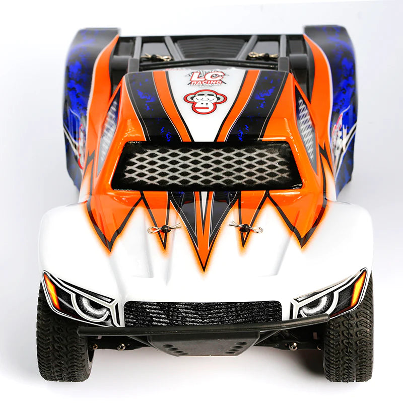 LC Racing EMB-SC 1/14 scale 4WD short course truck, blue and black RC model with detailed design and rugged tires.