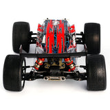 LC Racing EMB-T 1/14 scale 4WD RTR Truggy RC car with detailed body and off-road tires on a racing track.