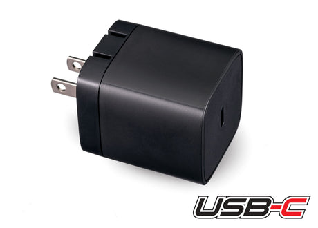 Traxxas 45-Watt USB-C power adapter, compact black charger with USB-C port and Traxxas branding, for fast device charging.