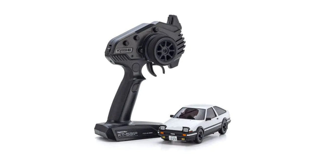Kyosho Mini-Z MA-020 AWD RC car modeled after the Initial D Sprinter Trueno AE86, detailed yellow and black sports car design.