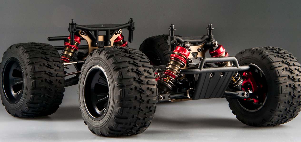 LC Racing EMB-MT 1/14 scale 4WD RC monster truck with large tires and detailed body, ready for off-road racing.
