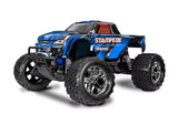 Traxxas Stampede 2WD HD remote control truck, blue color, front quarter view showing rugged tires and detailed body.