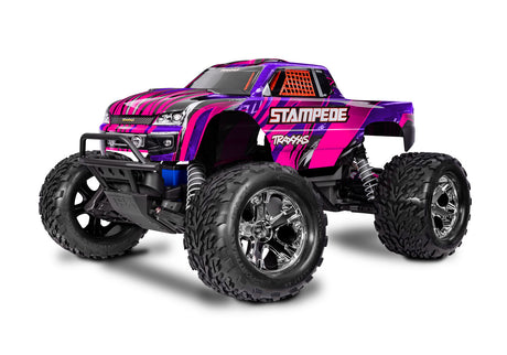 Pink Traxxas Stampede 2WD HD RC truck, front quarter view showing rugged tires and detailed body design.