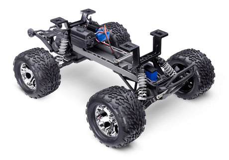 Traxxas Stampede 2WD BL-2s RC truck chassis viewed from a three-quarter front angle, showing the front and side details.