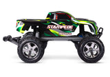 Traxxas Stampede 2WD BL-2s remote control monster truck with green and black body, large tires, and detailed side view.