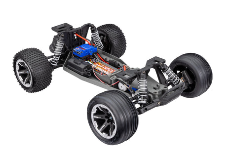 Traxxas Rustler 2WD HD RC truck with 3/4 chassis and USB-C port, shown from a three-quarter angle.